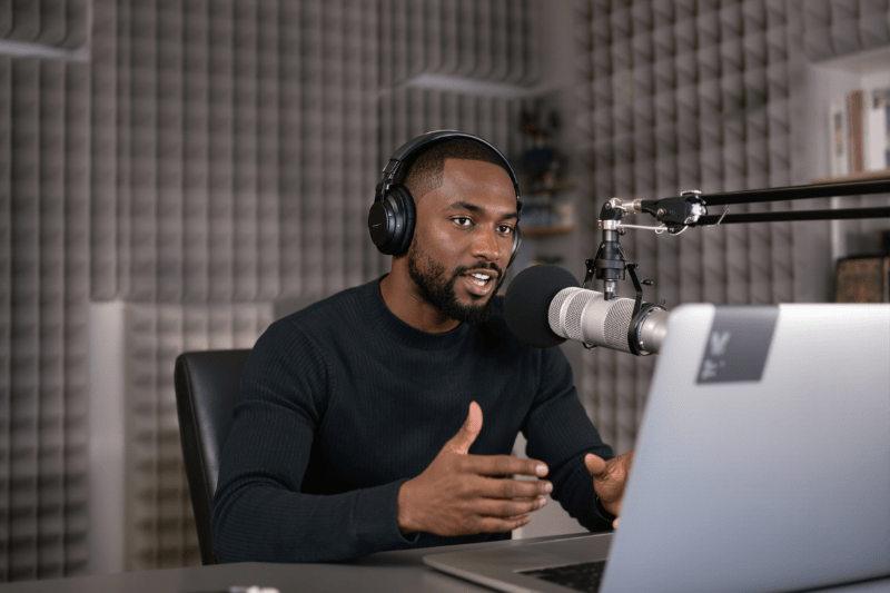 Podcaster recoding in their studio